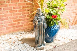 statue and flowers